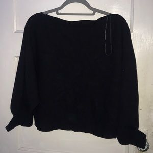 Wide-necked black sweater